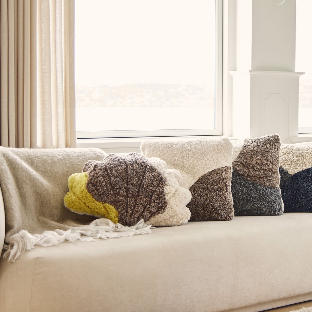 Trefarvet shell pude | Korthåret | New Zealand